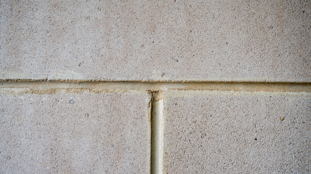 A close up of a white tiled wall