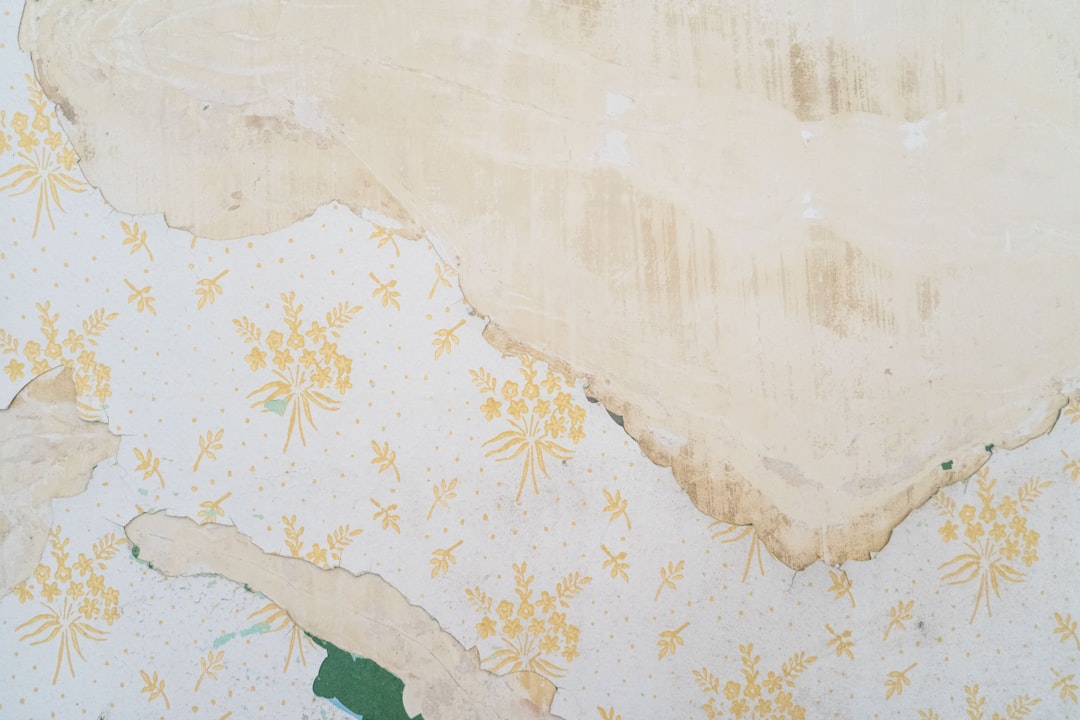 white and yellow floral textile